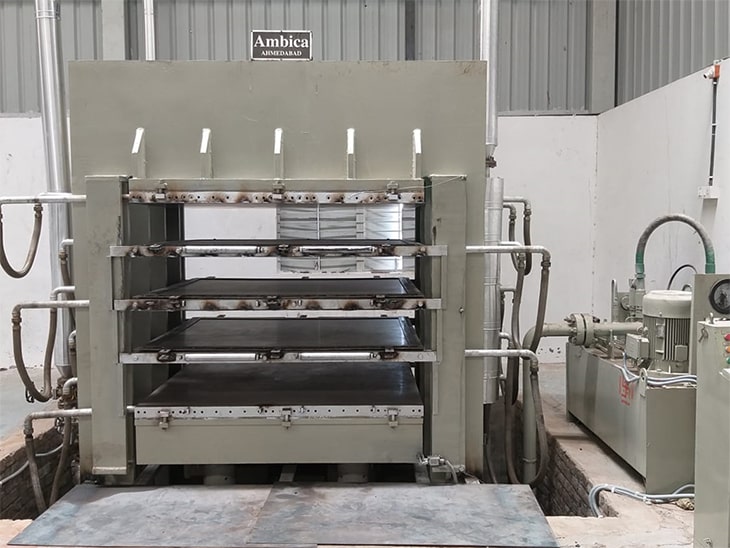 hydraulic-hot-press-conveyor-nitrile-natural-rubber-sheet-Ambica Press